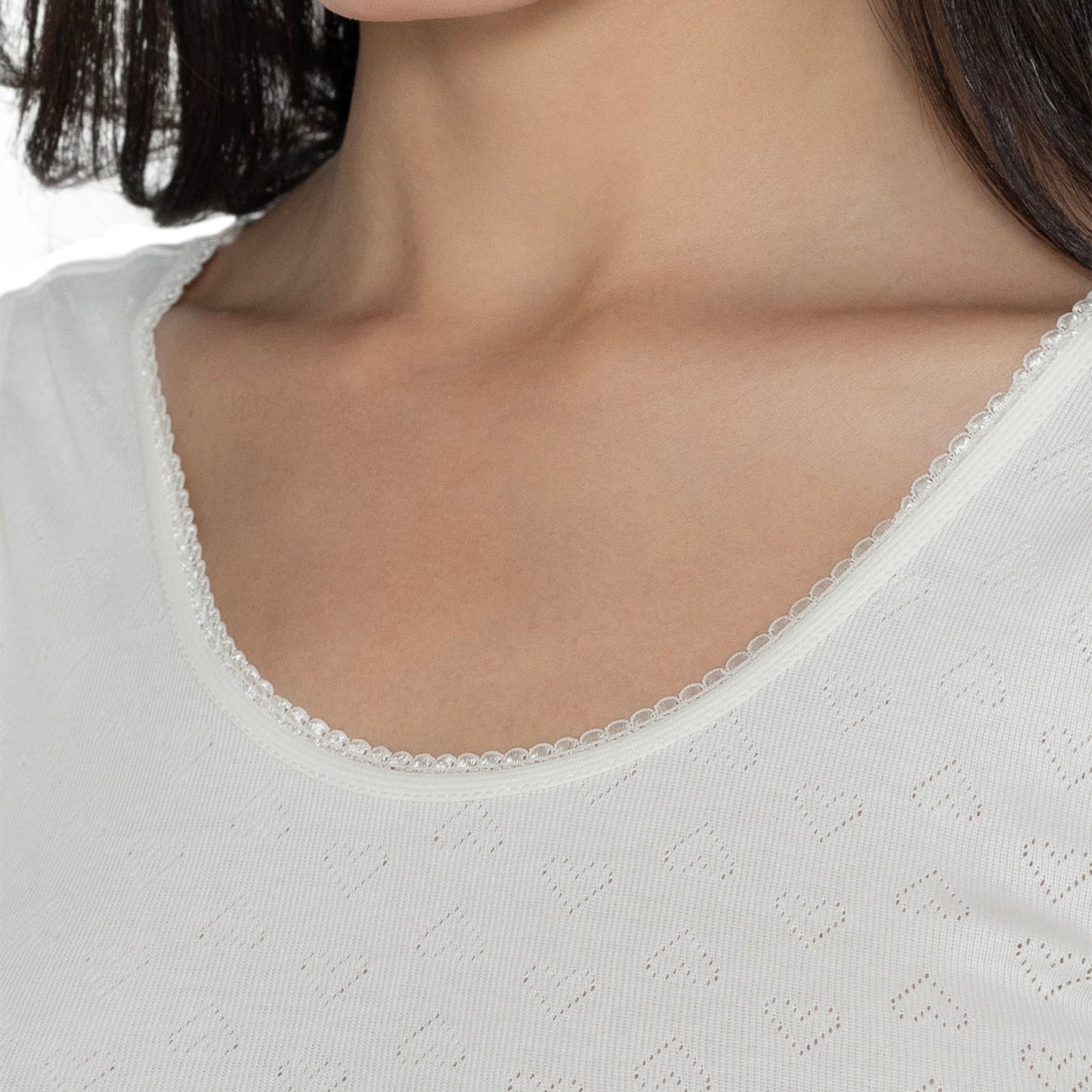 Vami Sleeve- less Thermal Top For Women in Off- White Color